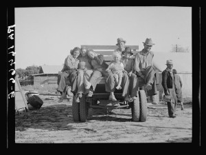 California pea pickers returning to camp after a day's work in the field, near Santa Clara, California (Source: Library of Congress)